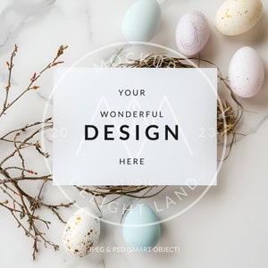 May include: A white card with the text "YOUR WONDERFUL DESIGN HERE" on a marble surface with a nest of twigs and colorful Easter eggs.