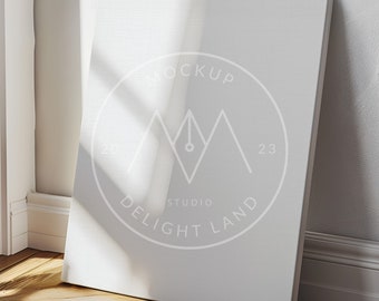 May include: A white canvas mockup with a white circle logo that says "MOCKUP STUDIO DELIGHT LAND 2023" in a minimalist font.