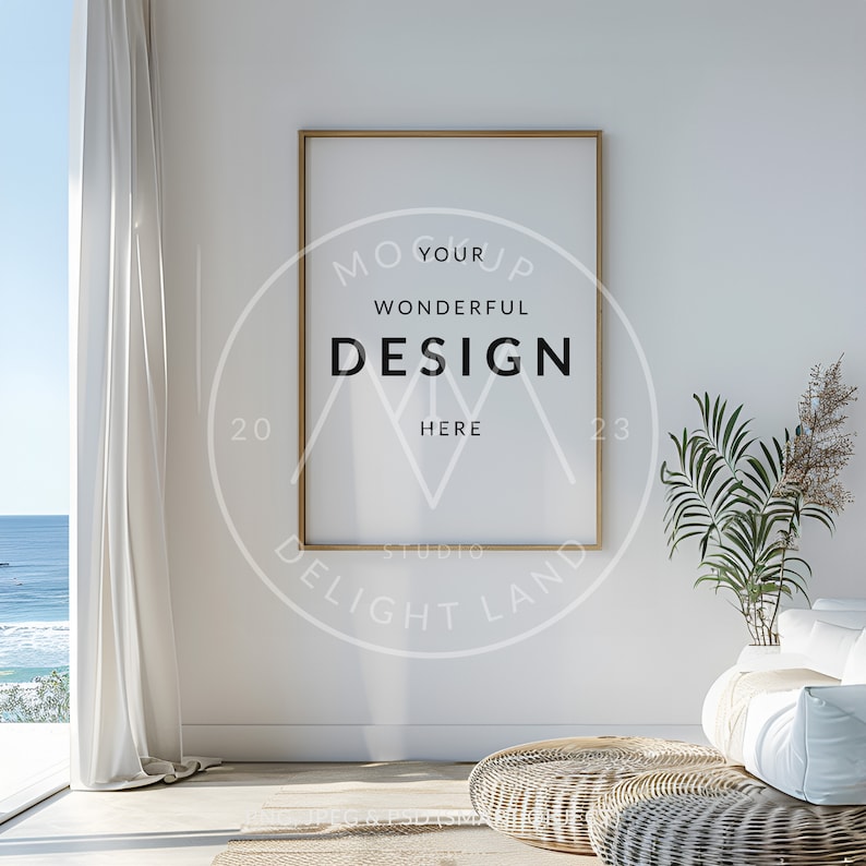 May include: A gold framed poster mockup with the text "Your Wonderful Design Here" in a circle with the text "Studio Delight Land" below it. The poster is hanging on a white wall in a room with a white couch, a potted plant, and a woven rug.