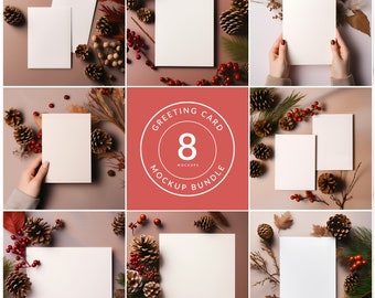May include: A set of 8 greeting card mockups featuring blank white cards surrounded by pine cones, red berries, and dried foliage on a brown background. The text "Greeting Card Mockup Bundle" is displayed in a circle with the number 8 in the center.