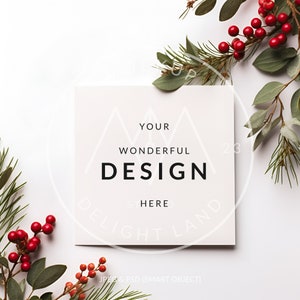 May include: A white card with the text "YOUR WONDERFUL DESIGN HERE" surrounded by green leaves and red berries on a white background.