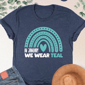 In January We Wear Teal Shirt, Cervical Cancer Awareness Shirt, Cervical Cancer Warrior Gift, Teal Ribbon Tee, Ovarian Cancer Support Shirt