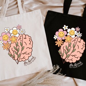 a couple of bags sitting on top of a bed