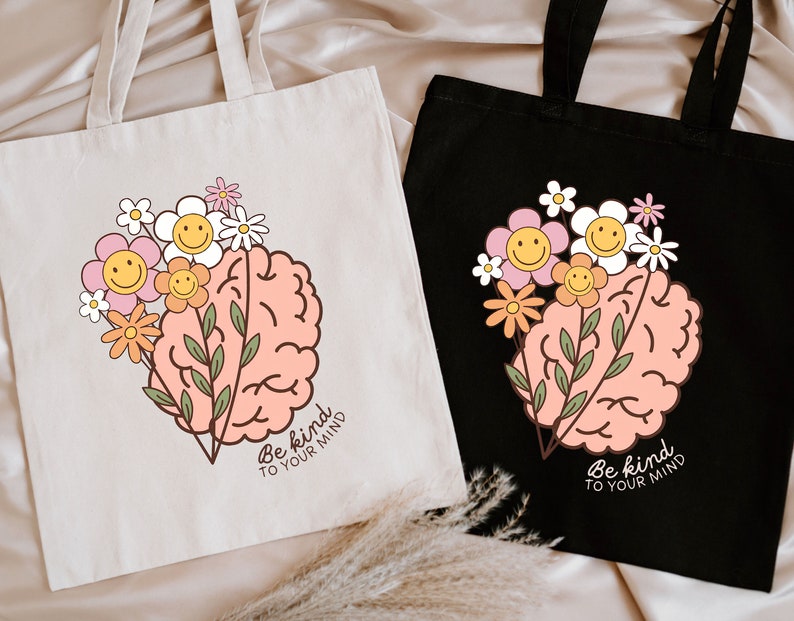 a couple of bags sitting on top of a bed