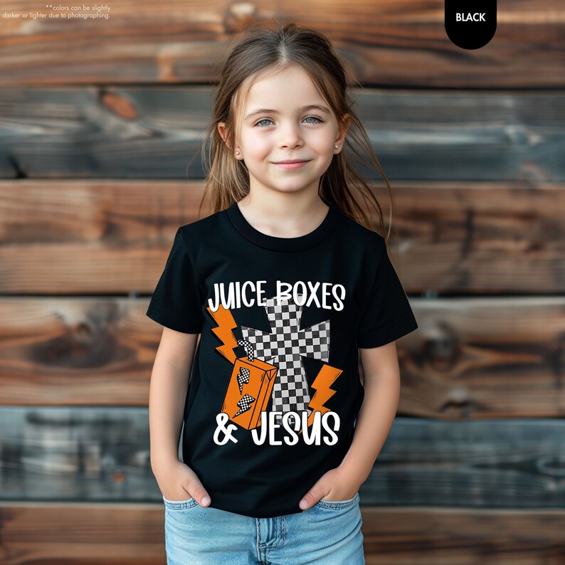 a little girl standing in front of a wooden wall