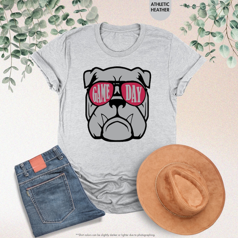 a t - shirt with a picture of a dog wearing sunglasses