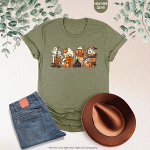 a t - shirt with a picture of halloween characters on it
