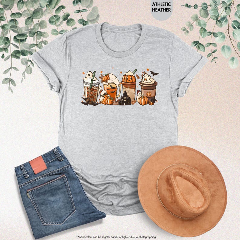 a t - shirt with a picture of a group of cats on it