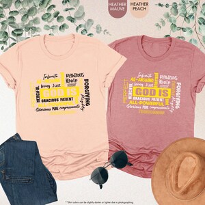 three t - shirts and a hat on a table