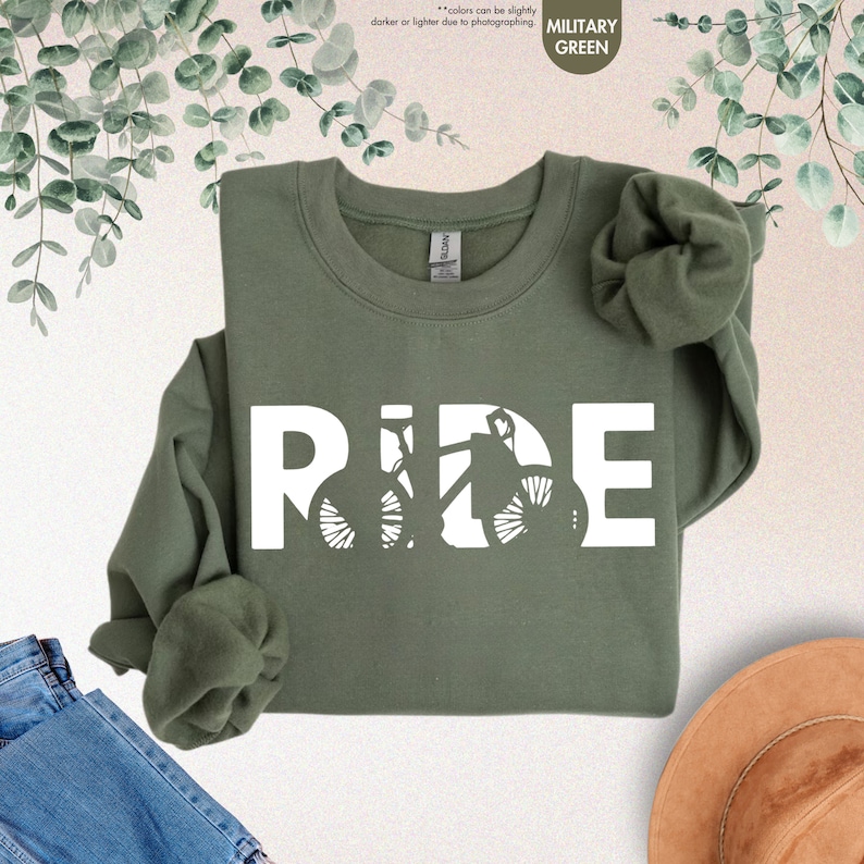 a green shirt with the word ride on it