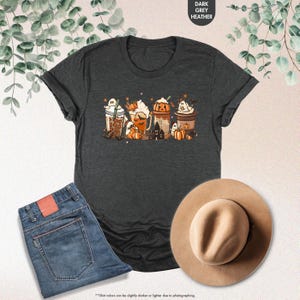a t - shirt with a picture of a group of pumpkins on it