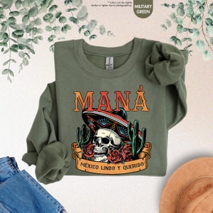 a green shirt with a skull wearing a sombrero