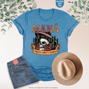 a blue shirt with a skull wearing a sombrero