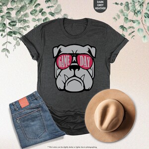 a t - shirt with a bulldog wearing sunglasses