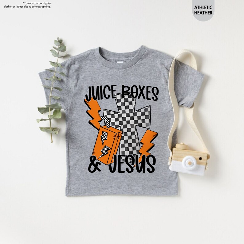 a t - shirt with the words juice boxes and jesus on it
