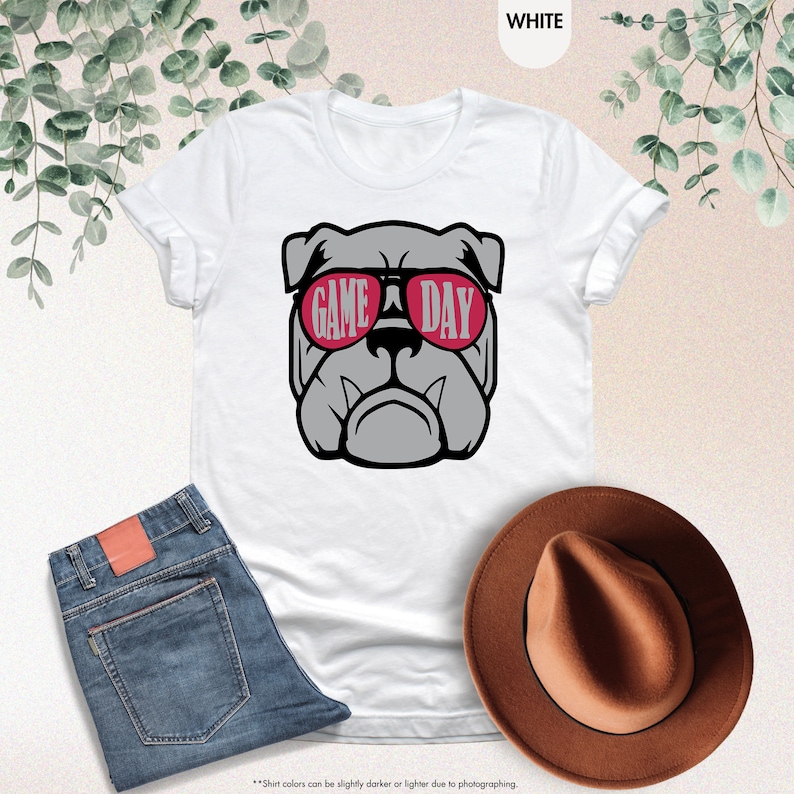 a white shirt with a dog wearing sunglasses