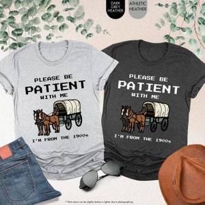 two t - shirts that say please be patient with me and i'm from