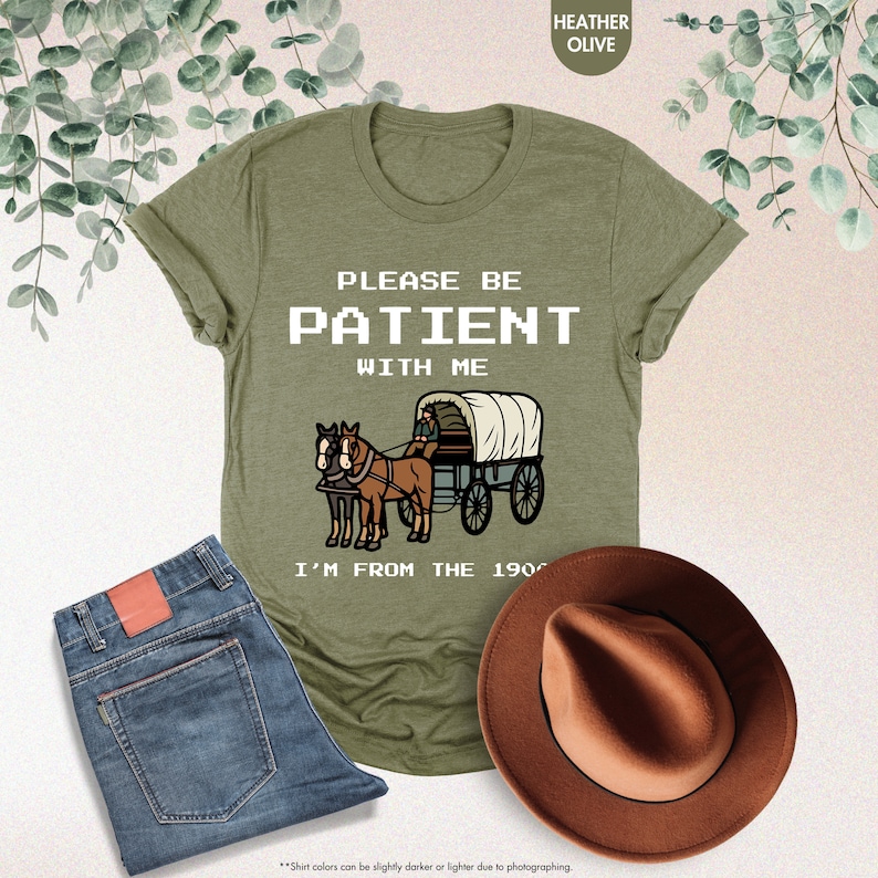 a t - shirt that says please be patient with me i'm from the