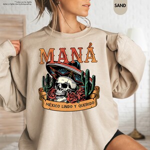 a woman wearing a sweatshirt with a skull wearing a sombrero