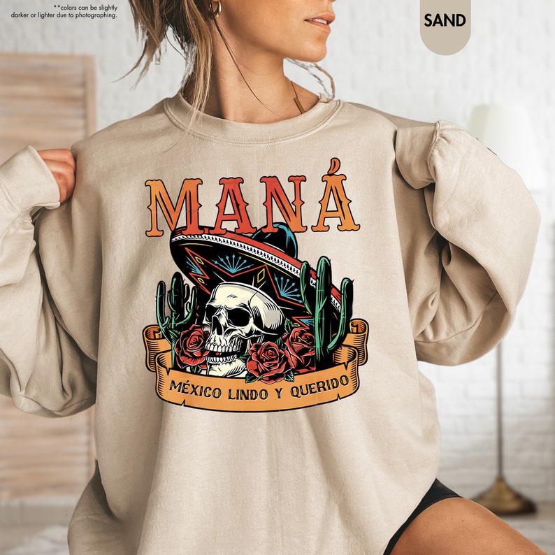 a woman wearing a sweatshirt with a skull wearing a sombrero
