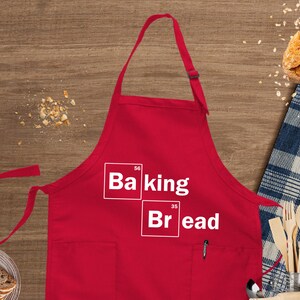 a red apron with the words baking and bread on it