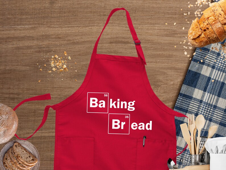 a red apron with the words baking and bread on it