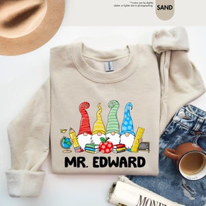 a sweater that says mr edward on it