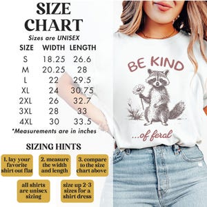 May include: White t-shirt with a black and white illustration of a raccoon holding a flower. The text "Be Kind...of feral" is printed in pink on the shirt. A size chart is included with width and length measurements in inches.