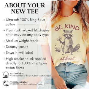 May include: A yellow t-shirt with a raccoon graphic and the text "Be Kind...of feral". The shirt is made of 100% ring spun cotton and is pre-shrunk for a relaxed fit. The shirt is also sustainably made with low-impact dyes.