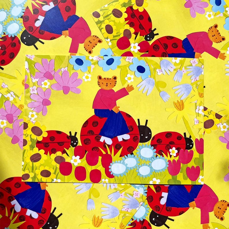 May include: A whimsical illustration featuring a tiger-like character in a pink shirt and blue pants, seated on a large red ladybug with black spots. The background is a vibrant yellow with flowers and more ladybugs.