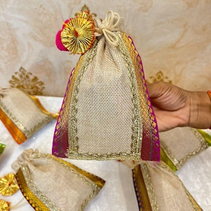 May include: A set of three ceramic mugs with a speckled, matte finish. The mugs are in shades of cream, light grey, and dark grey. Each mug has a simple, minimalist design, ideal for coffee or tea.