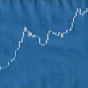 May include: A white line chart on a blue background showing an upward trend. The chart is a visual representation of data points over time.