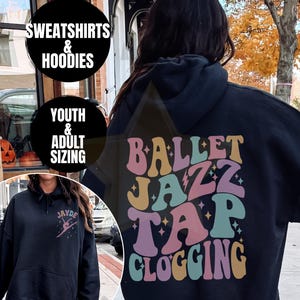 May include: Black hoodie with the words "BALLET JAZZ TAP CLOGGING" in colorful retro font on the back. The front of the hoodie has a small graphic and the name "JAYDE". The image also shows text that says "SWEATSHIRTS & HOODIES" and "YOUTH & ADULT SIZING".