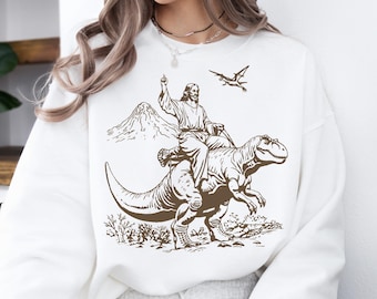 Jesus Riding Dinosaur Shirt, Funny Shirt For Men, Women UFO Sweatshirt, Christian Apparel Tee, Cool Graphic Shirt, Crazy Rex Novelty Tee