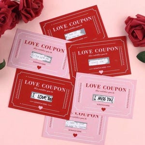 May include: A selection of red and pink love coupons with scratch-off panels. The coupons display phrases such as "I Love You" and "Marry Me." Red roses are arranged around the coupons on a pink surface, creating a romantic theme.