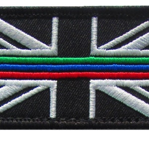 May include: Black embroidered patch with a white Union Jack flag design and a thin blue line with red, green, and blue stripes.