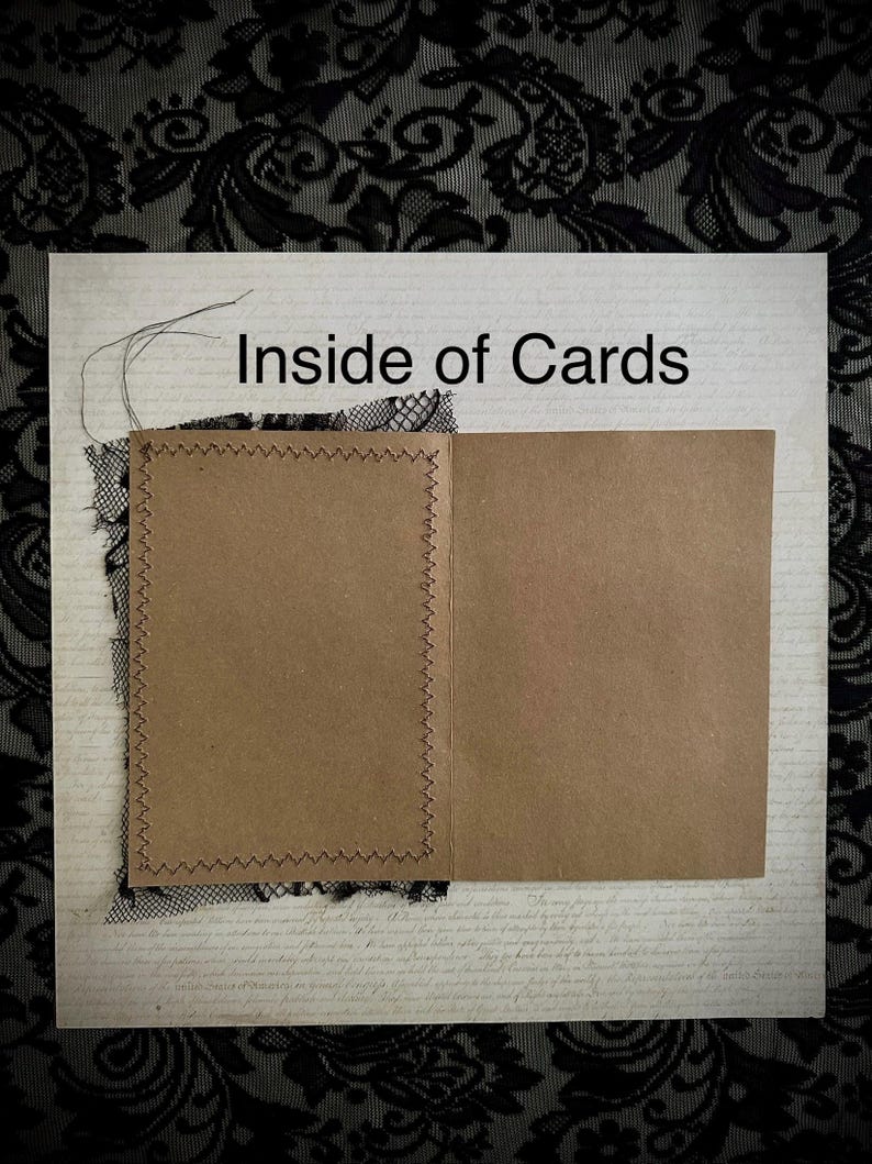 May include: An open greeting card with the text "Inside of Cards" is displayed. The card is made of brown paper and has a stitched border. Black lace and a patterned background are also visible.