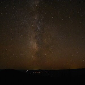 Midnight's Celestial Tapestry: A Captivating Night Sky Odyssey