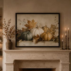 May include: A living room featuring a stone fireplace with a burning fire, a framed painting of pumpkins and autumn leaves above the mantel, a wooden coffee table with small pumpkins, and beige upholstered seating with brown throw pillows.