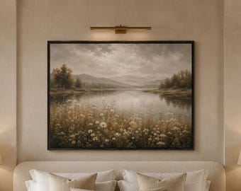 May include: A bedroom featuring a large bed with beige bedding, a textured cream bench with a folded throw blanket, two wooden nightstands with lamps, and a landscape painting of a lake and wildflowers hanging on a beige wall with arched alcoves.