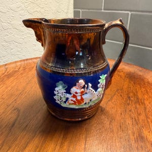 Allerton Longton Pottery England Luster Copper tone Relief Scene 4 1/4"h Creamer