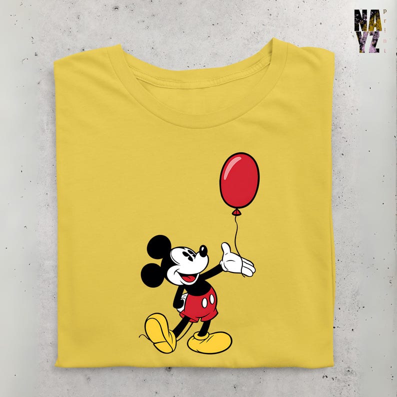 May include: A yellow t-shirt with a cartoon image of Mickey Mouse holding a red balloon. Mickey Mouse is wearing red shorts with two black buttons.