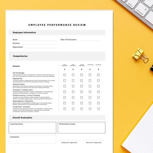 May include: A black and white printable employee performance review form with sections for employee information, competencies, overall evaluation, learning goals, performance goals, comments, employee signature, and reviewer signature. The form has a title that reads "Employee Performance Review".
