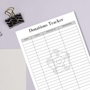 May include: A black and white printable donations tracker with columns for date, value, donated to, and description. The tracker has a simple design with a graphic of hands forming a heart in the center.