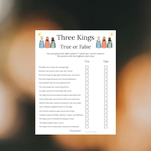 May include: A white paper game sheet titled Three Kings True or False featuring illustrations of three kings at the top. The sheet includes a list of fifteen statements about the Magi with checkboxes for True or False answers and a total points line.