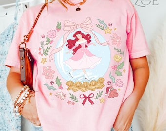 Comfort Colors® Disney Princess Ariel Snow Globe Christmas Shirt,Disney Princess Ariel Xmas, Coquette Bow Christmas Tee,Little Mermaid Shirt
