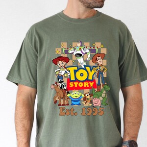 Comfort Colors Checkered Toy Story Shirt, Disney World Toy Story Shirt, You Ve Got A Friend In Me Shirt, Toy Story Movie Characters Tee imagem 4