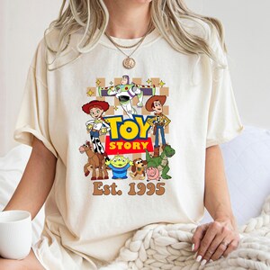 Comfort Colors Checkered Toy Story Shirt, Disney World Toy Story Shirt, You Ve Got A Friend In Me Shirt, Toy Story Movie Characters Tee imagem 3