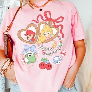 Comfort Colors Coquette Bow Mario Shirt, Retro Epic Universe Mario  Shirt, Disney Shirt, Orlando Park Epic Universe Shirts