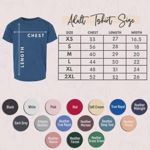 May include: A heather blue t-shirt with a size chart labeled Adult Tshirt Size, listing measurements in inches for sizes XS through 2XL. Below the chart are nineteen circular color swatches labeled with names including Black, White, Pink, Red, Soft Cream, True Royal, Heather Midnight, Dark Grey, Athletic Heather, Heather True Royal, Heather Maroon, Heather Deep Teal, Heather Peach, Heather Mauve, Heather Forest, and Heather Grass Green.